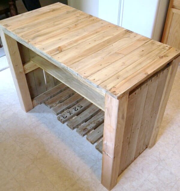 When we were living in a rental, our home was lacking a counter space, so we built a DIY Pallet Kitchen Island for less than $50.
