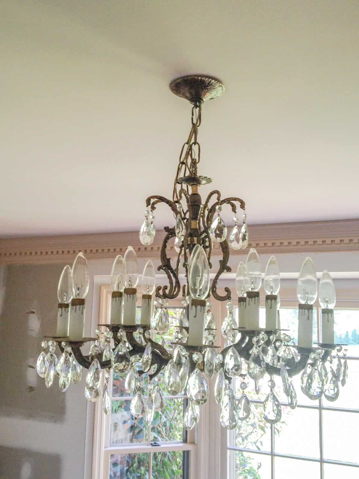 old brass chandelier with crystals