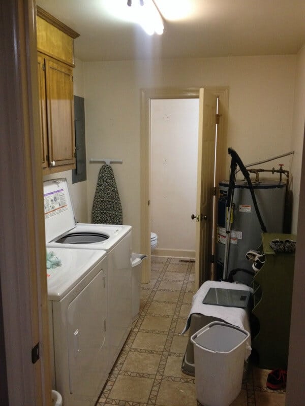 These homeowners transformed their dated laundry room into a gorgeous, vintage inspired laundry room! I love the drying rack!