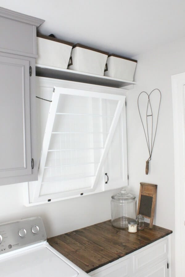 These homeowners transformed their dated laundry room into a gorgeous, vintage inspired mudroom! I love the drying rack!