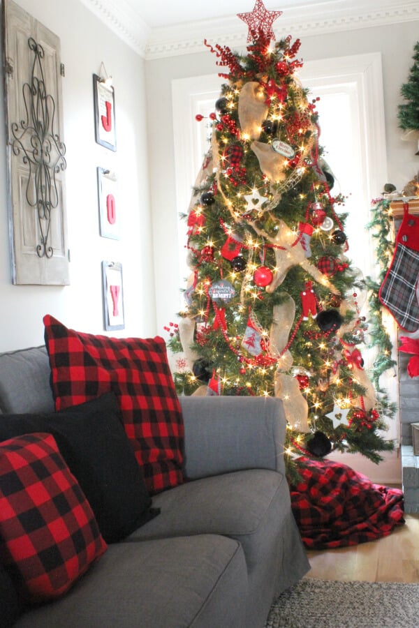 living room decorated with buffalo check decor for christmas