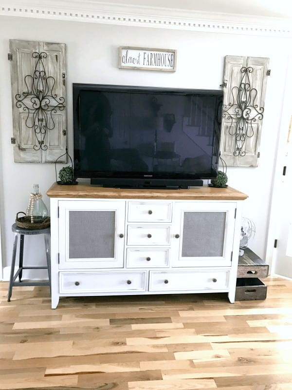 Easy Entertainment Center Makeover: I love how this blogger took a dated entertainment center that no longer matched her decor and updated it into a stunner!