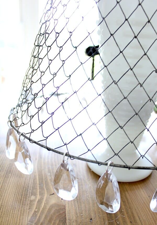 DIY Chandelier: This blogger takes an ordinary mesh basket and turns it into something stunning!