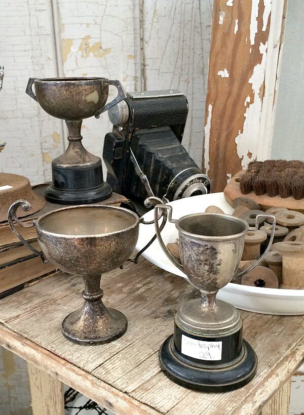 Vintage trophies can be expensive. This is how you can make a new trophy look vintage with this DIY Tarnished Trophy tutorial.