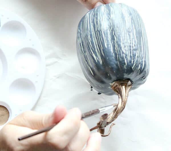 How to make your own crackle painted pumpkins to match your fall decor colors!