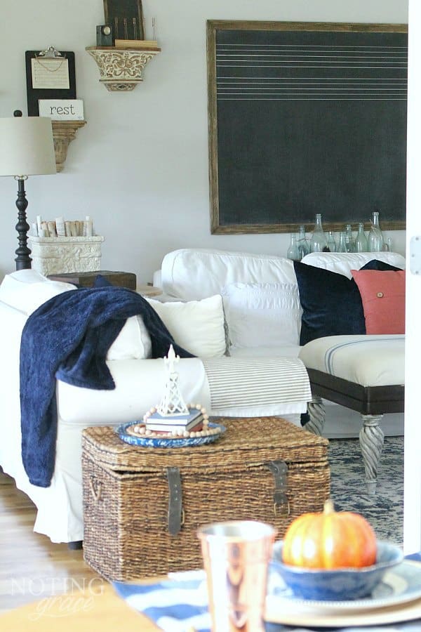 Cozy Fall Farmhouse Decor in Navy and Orange - the hottest color of the year is navy. Here's how to incorporate this cozy color in your fall decor.