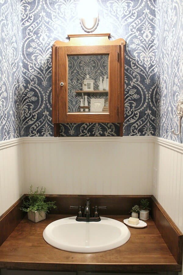 How to create a Vintage Farmhouse Powder Room for less than $500. We were on a tight budget, but it didn't keep us from creating the half bath we wanted!
