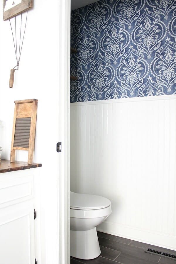 How to create a Vintage Farmhouse Powder Room for less than $500. We were on a tight budget, but it didn't keep us from creating the half bath we wanted!