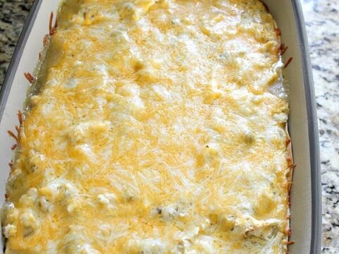 Stop rolling those Enchiladas! With this Cheesy Chicken Enchilada bake - you'll save time and energy creating a family favorite dish. Plus this is great for last minute meals! This is a recipe you definitely want to try!