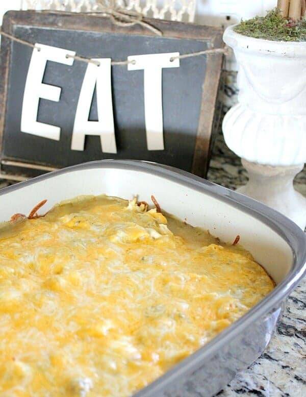Stop rolling those Enchiladas! With this Cheesy Chicken Enchilada bake - you'll save time and energy creating a family favorite dish. Plus this is great for last minute meals! This is a recipe you definitely want to try!