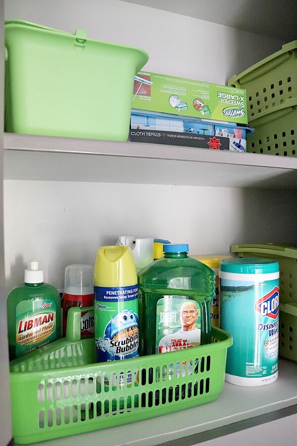Organizing laundry and cleaning items into zones helps in controlling mudroom clutter.