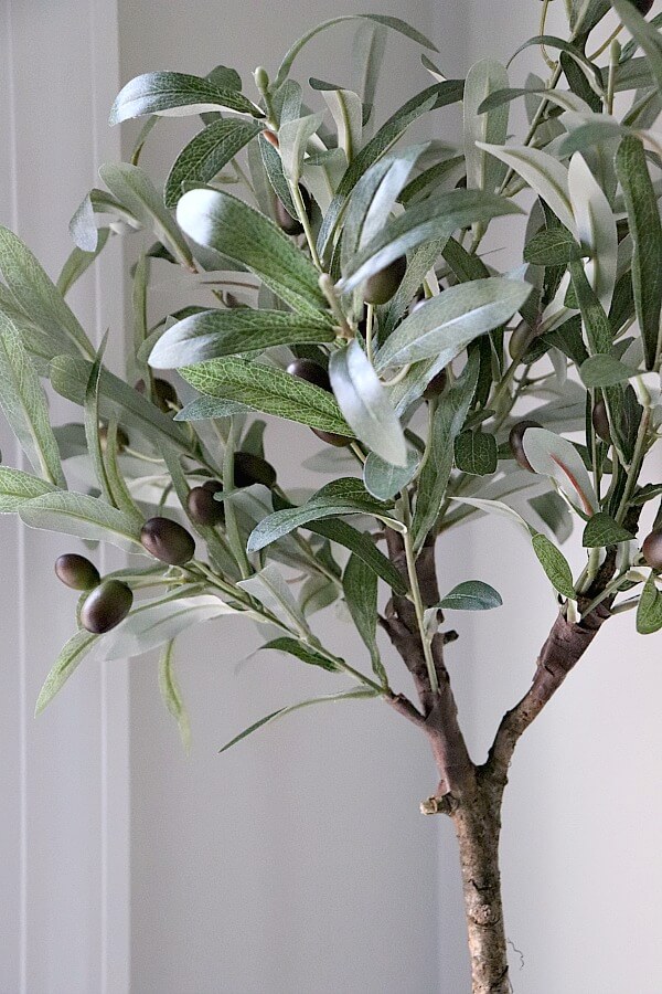 Another Ballard's Knockoff! Inspired by their latest Olive Topiary, I saved $70 by making one myself and you can too with this Easy DIY Faux Olive Topiary tutorial!