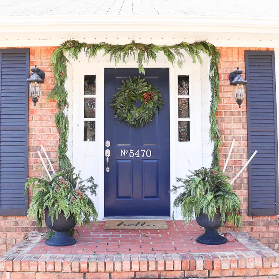 We are excited to be a part of Delaney's 12 Doors of Christmas campaign and can't wait to show you how an  Easy Front Door Refresh for Christmas is the perfect DIY to welcome all your holiday guests.