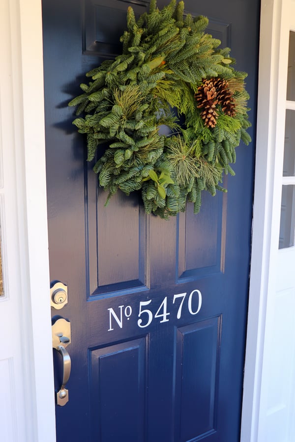 We are excited to be a part of Delaney's 12 Doors of Christmas campaign and can't wait to show you how an  Easy Front Door Refresh for Christmas is the perfect DIY to welcome all your holiday guests.