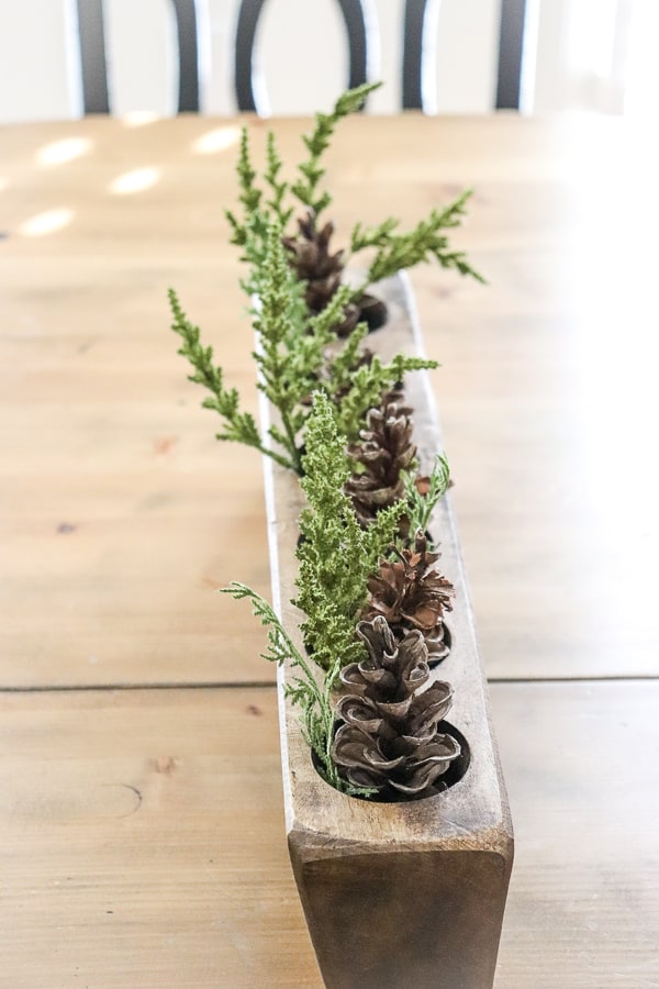 Sugar molds, pine cones, and greenery are a great way to ease into the winter season after wrapping up your Christmas.