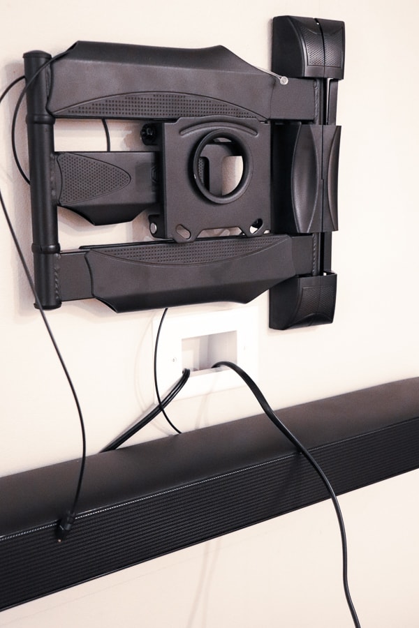 tv mount hung on a wall 