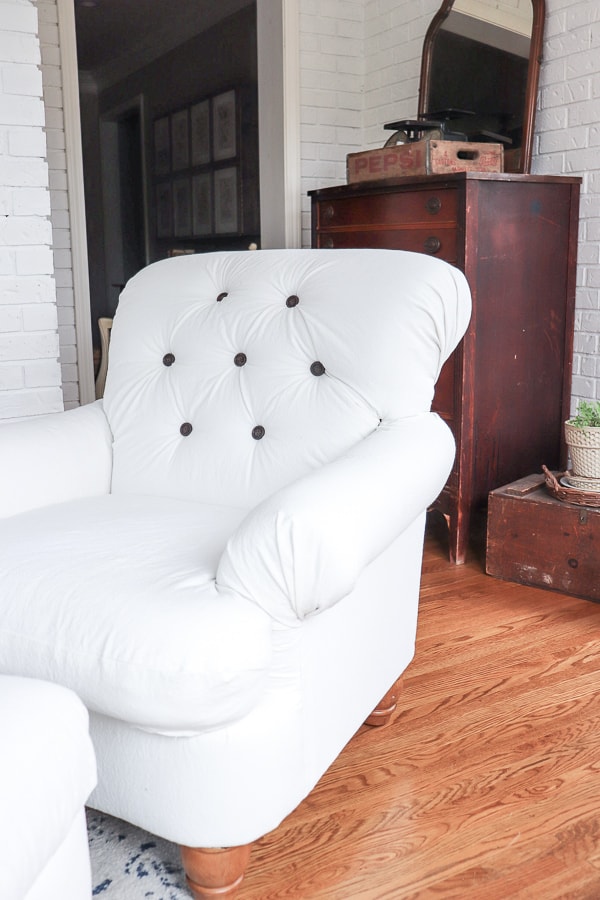 When I found a chair for $35 on a buy/sell/trade site, I knew I could flip the chair into something perfect for my home. Here's an easy DIY reupholstered chair and ottoman that took just a few days to complete.