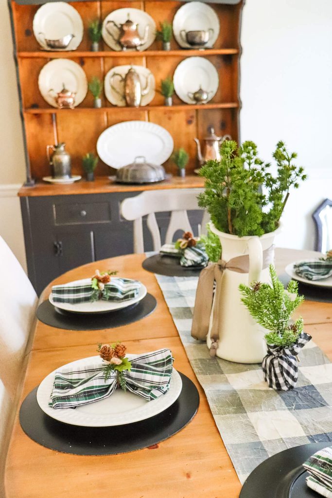 Casual Black White and Green Christmas Tablescape table