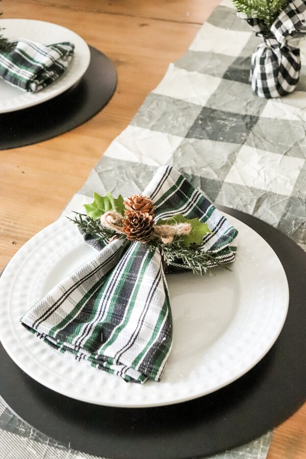 Casual Black White and Green Christmas Tablescape plate close up