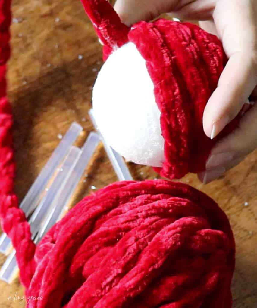 making a diy chunky knit covered yarn ornament