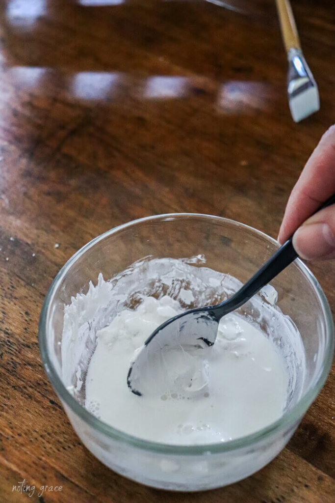 mixing Bianco Classico Limewash in a bowl