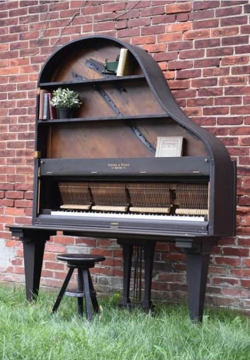 old piano made into a desk with hutch