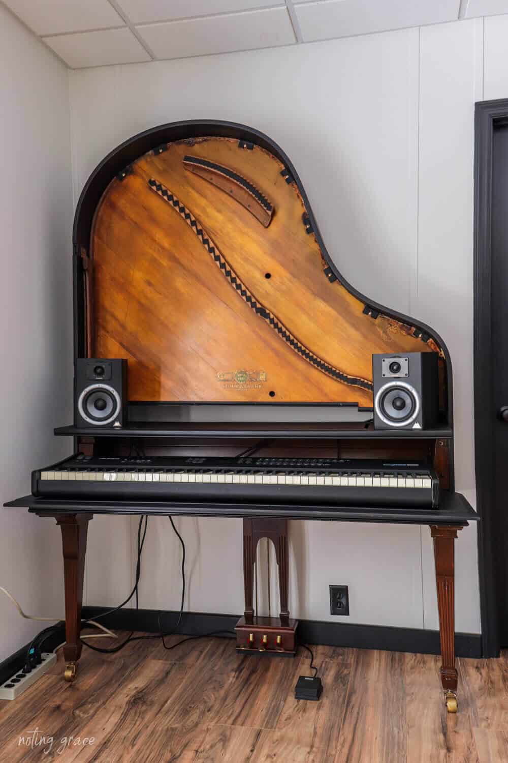 Old piano reinvented into a keyboard stand