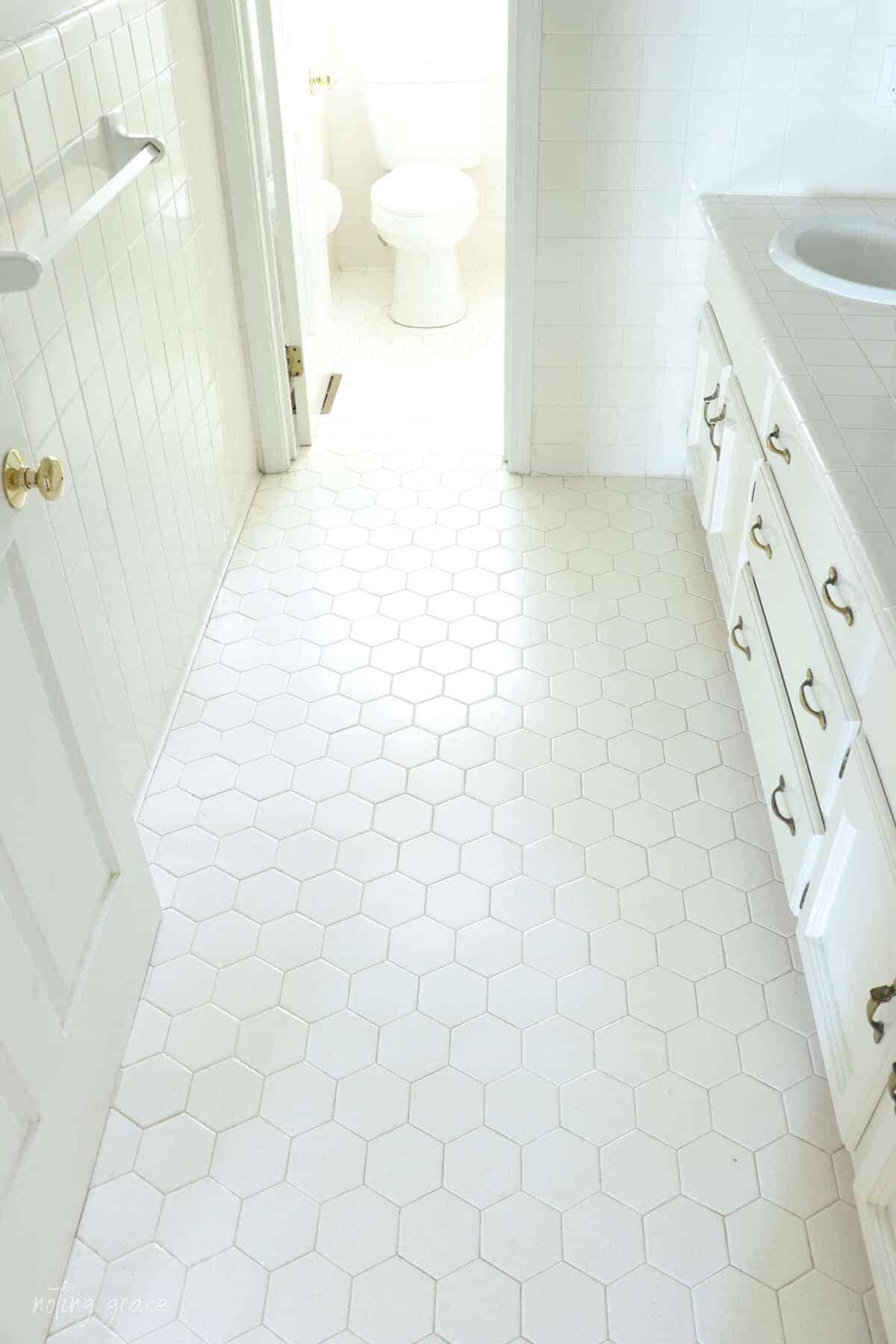 White bathroom deals floor tile