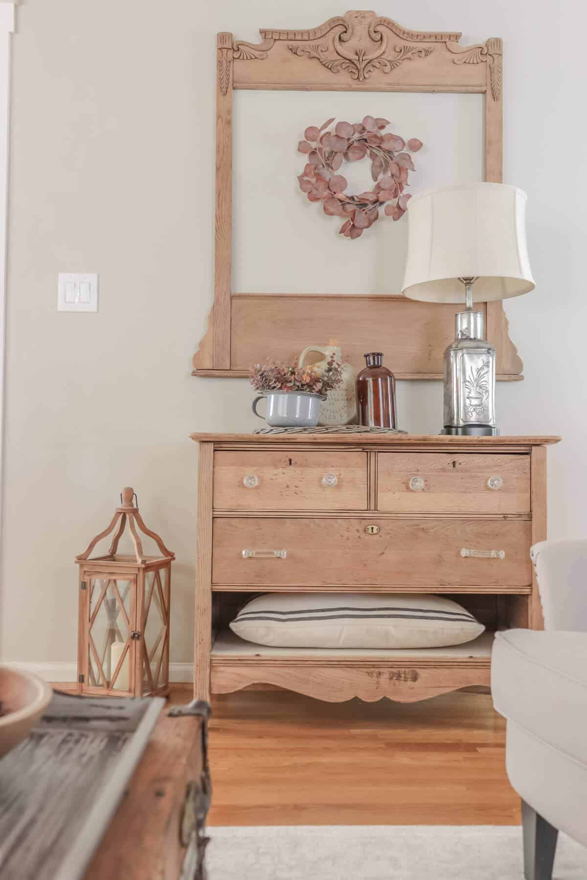 Vintage dresser decorated for fall with burgundy and gray fall decor