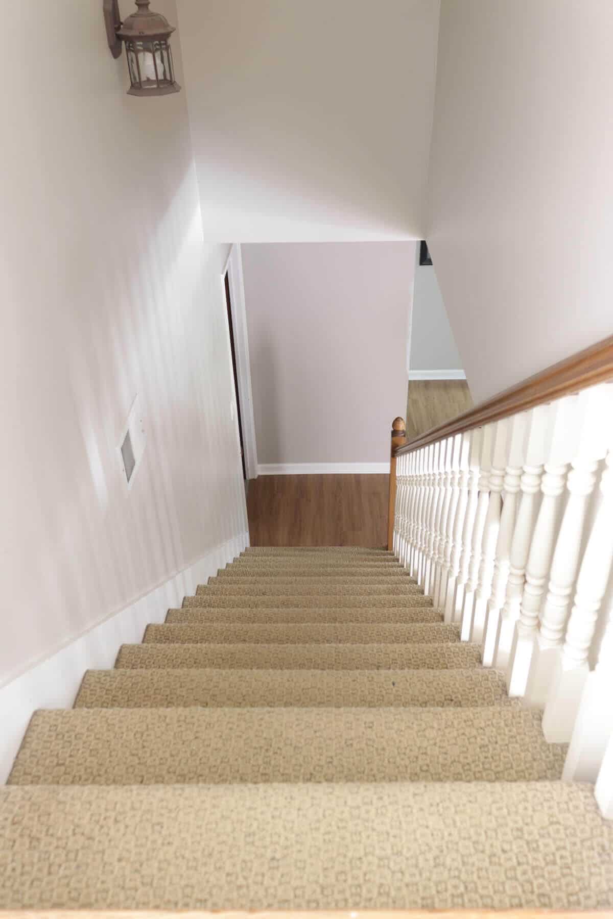 dated stairway with ugly tan carpet