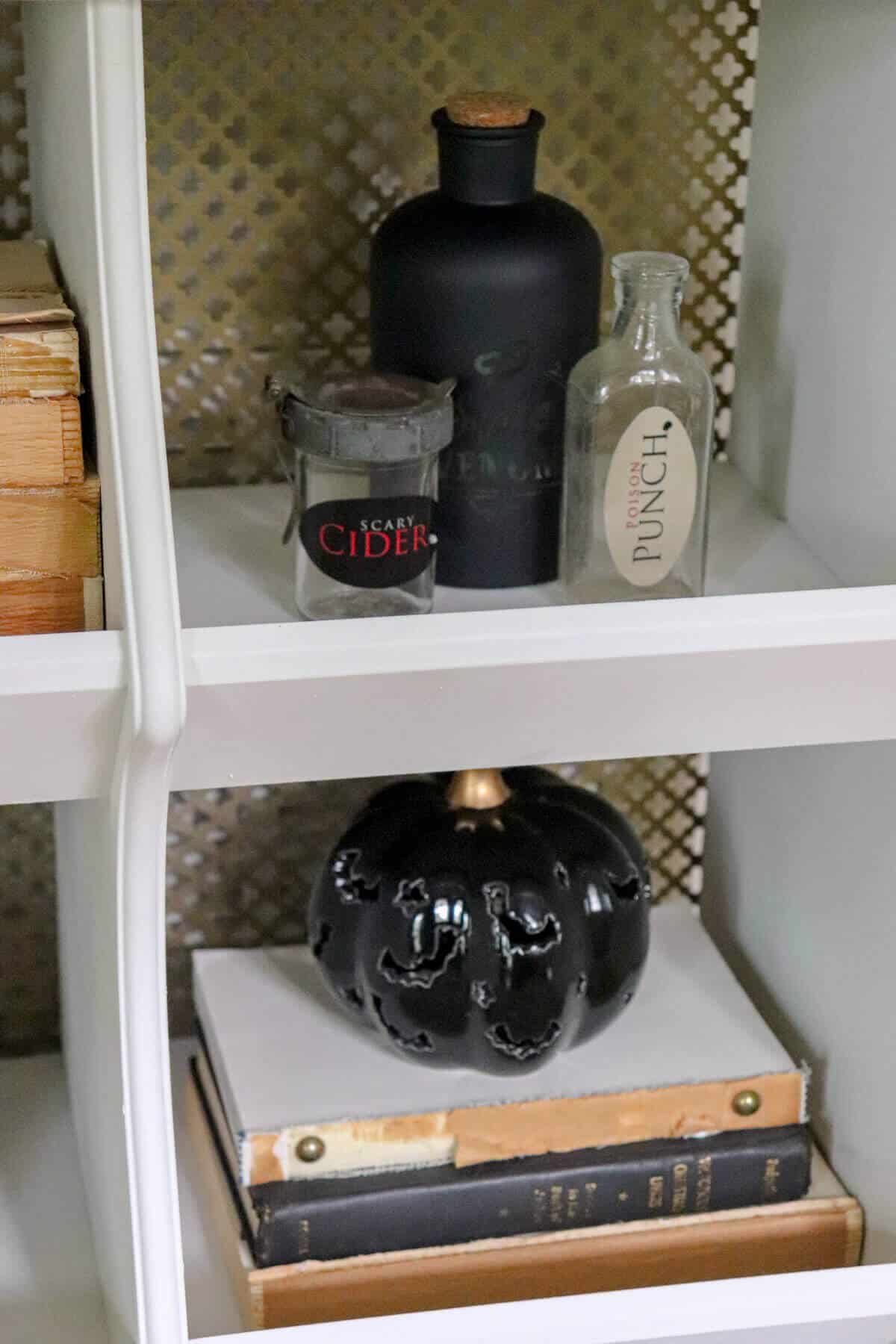 shelves decorated with halloween decor