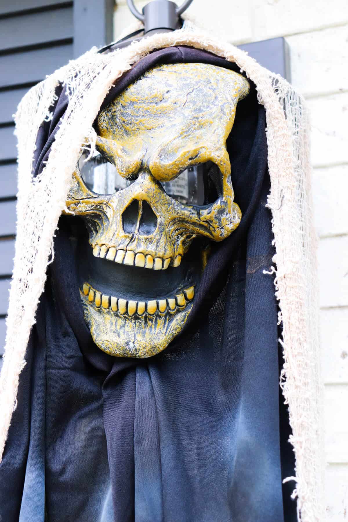 halloween mask covering exterior light