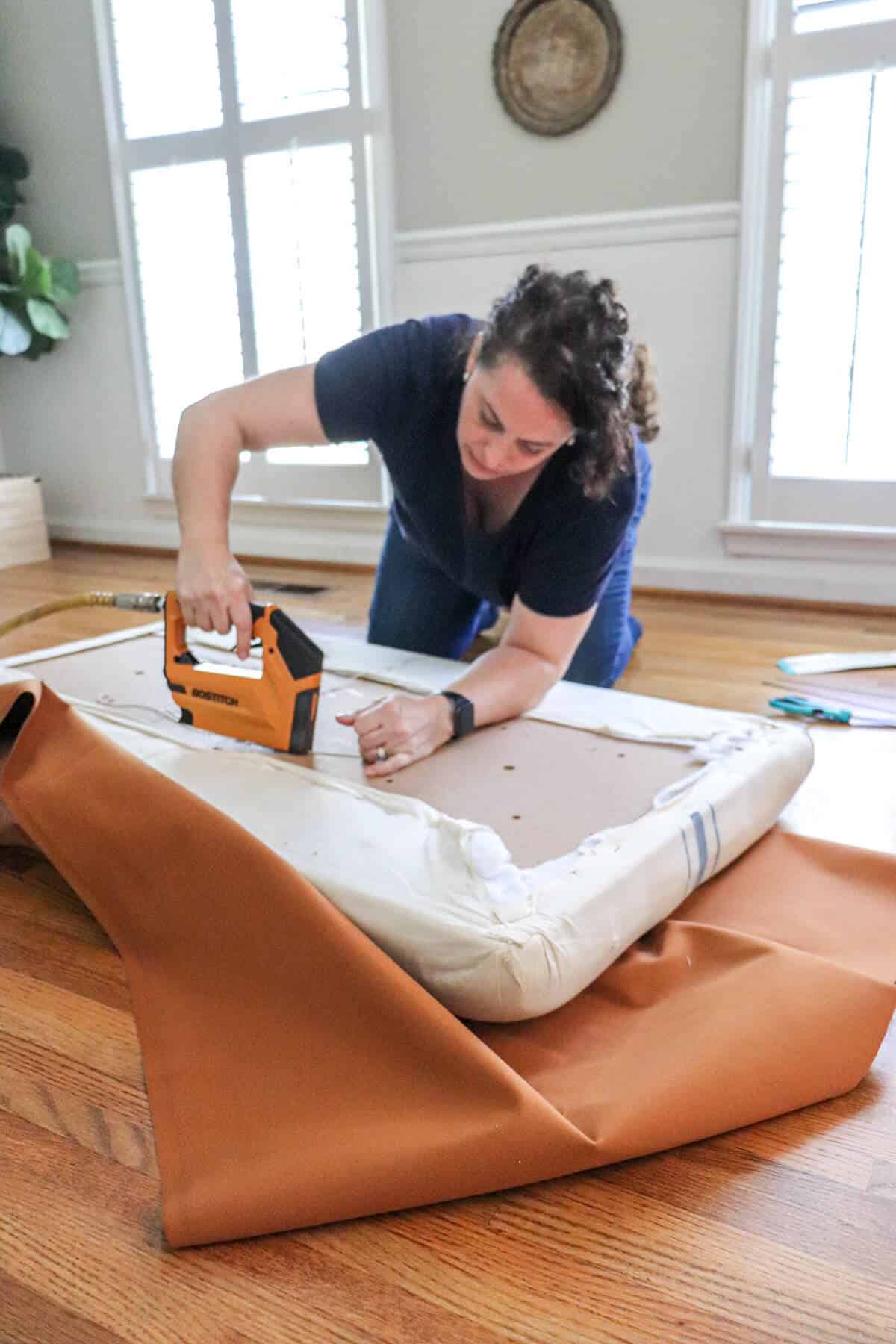 tufting an ottoman with faux leather