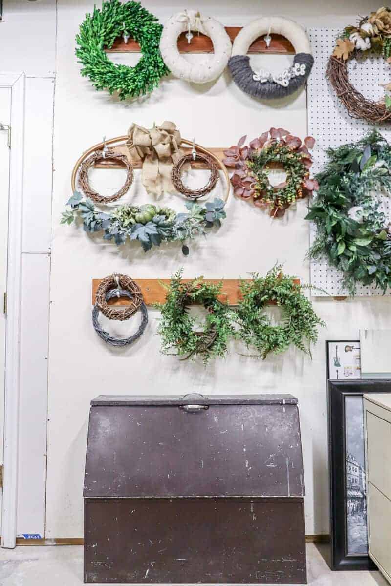 peg board and hooks used to hang wreaths for your home