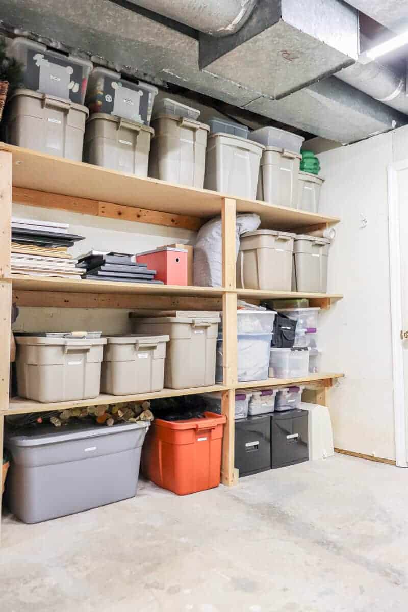 basement furnace and storage room with built in shelving