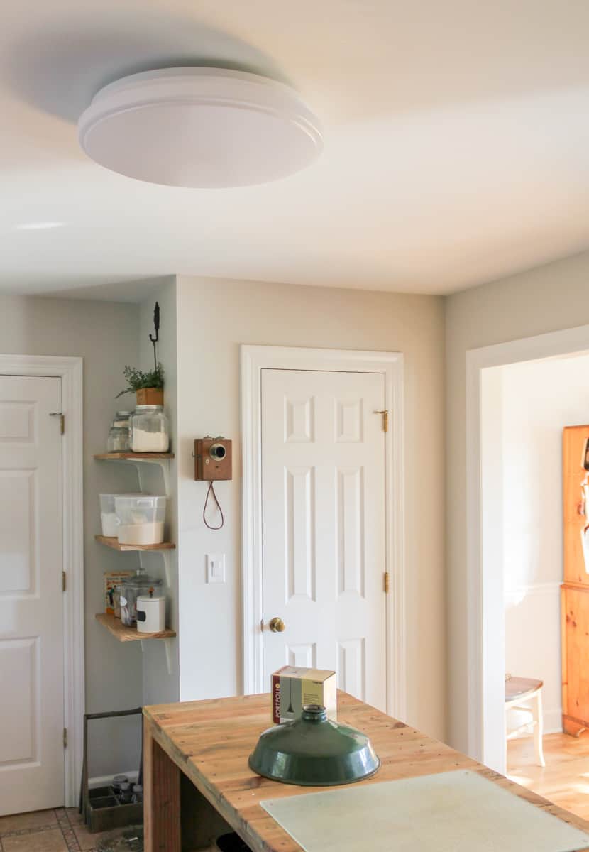 kitchen with round flush mount ceiling light