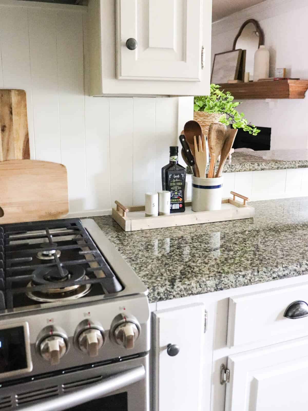 diy faux marble tray used to hold utensils in kitchen