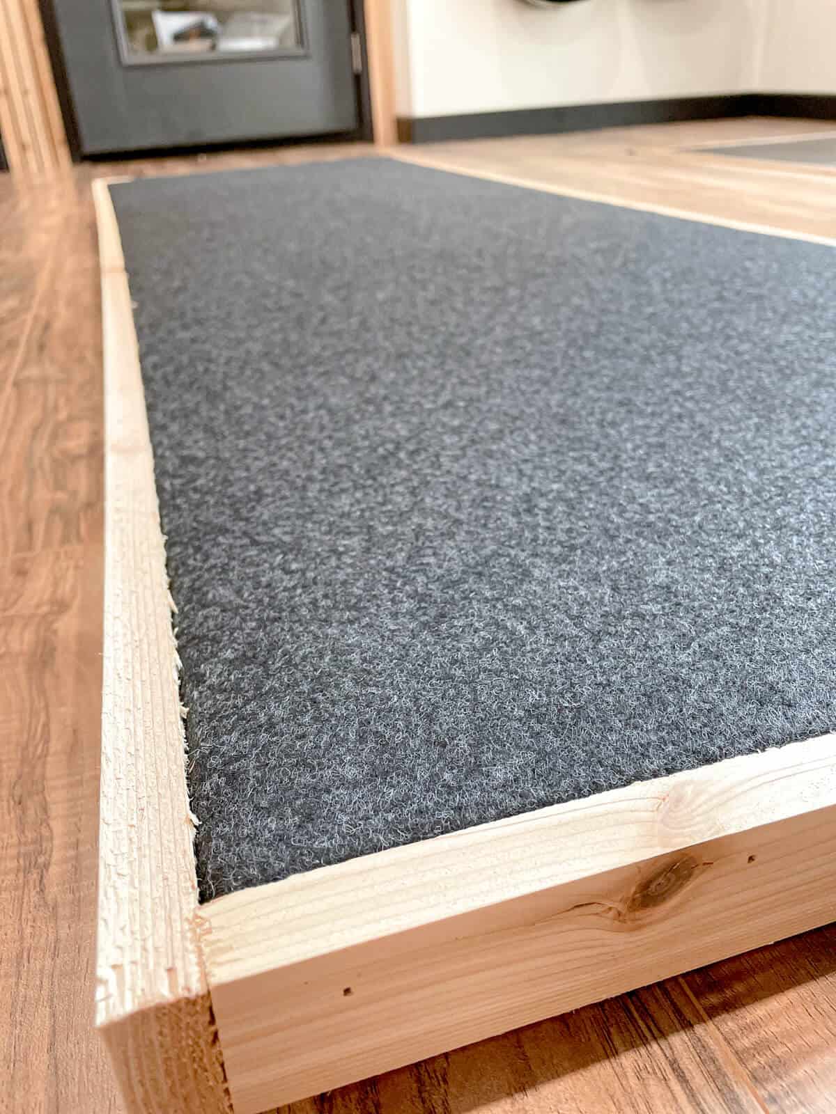 soundproof panel made with gray felt and cedar trim