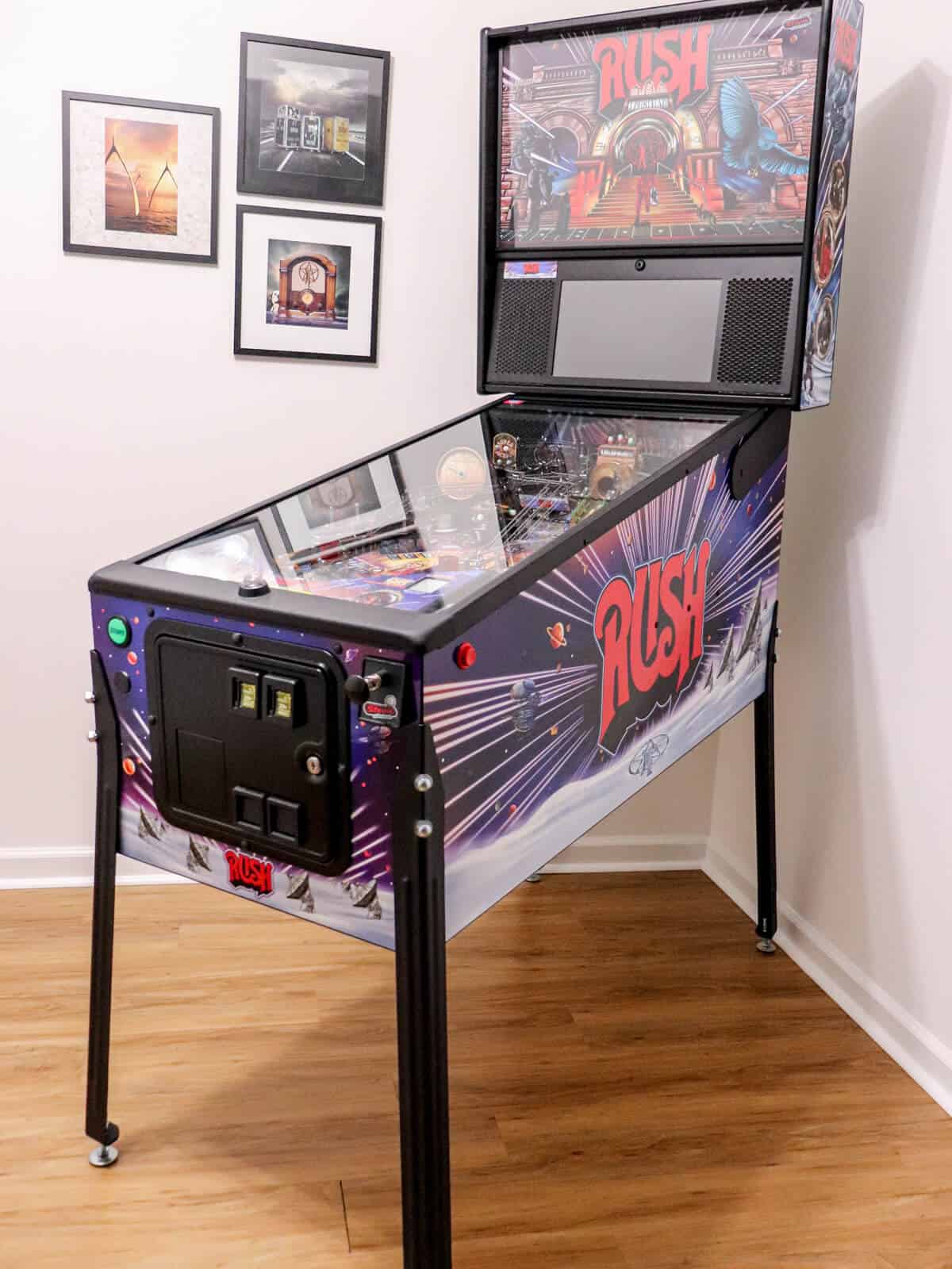 Rush pinball machine by Stern in a basement room