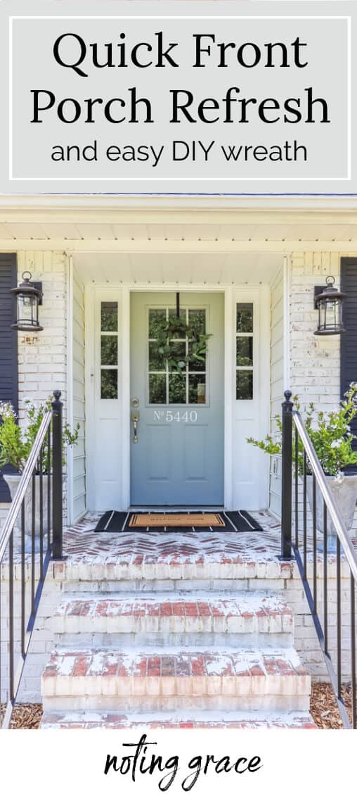 light gray front door with wreath and layered door mats