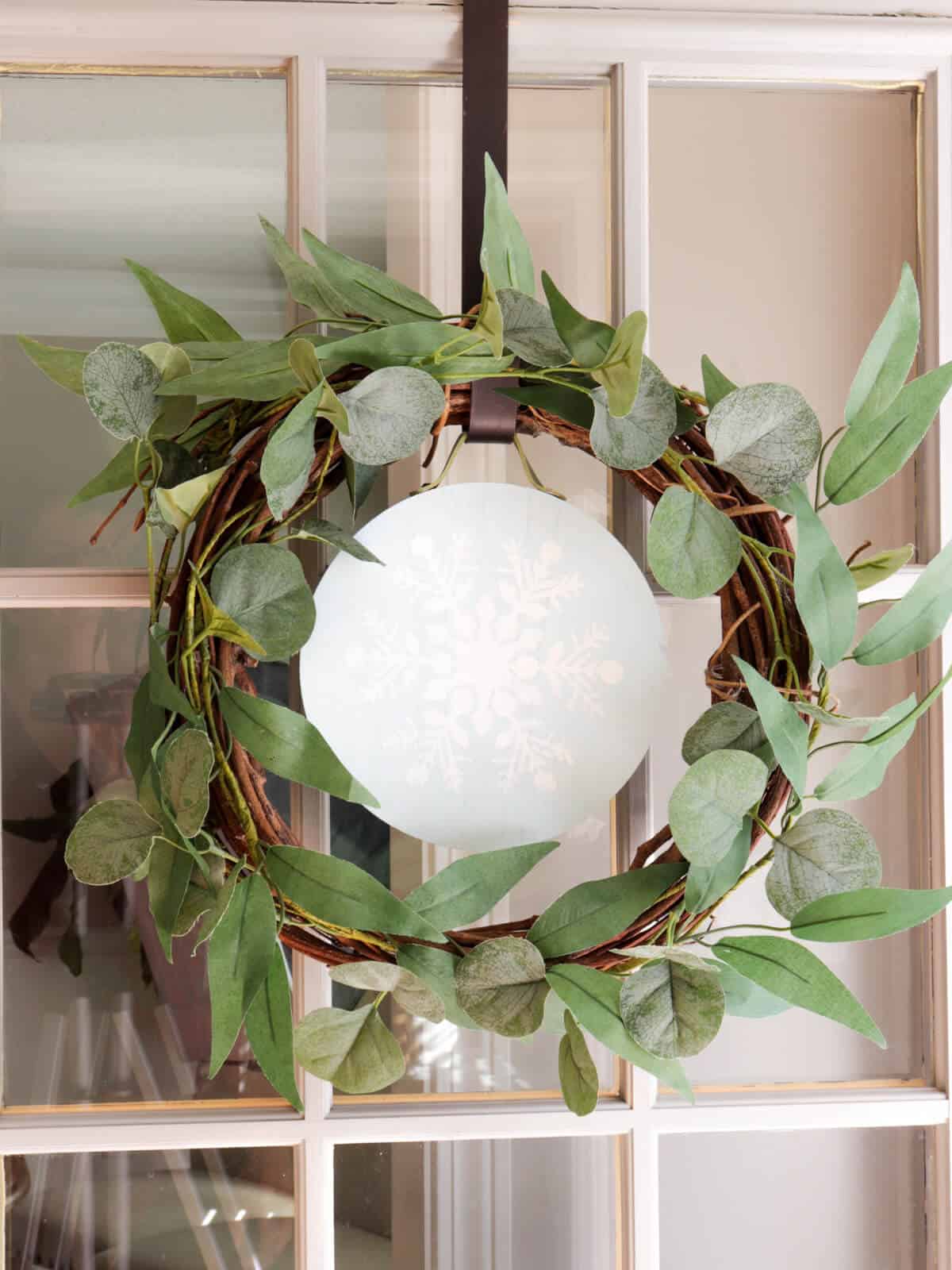 door wreath with an easy seasonal interchangeable disc with a snowflake