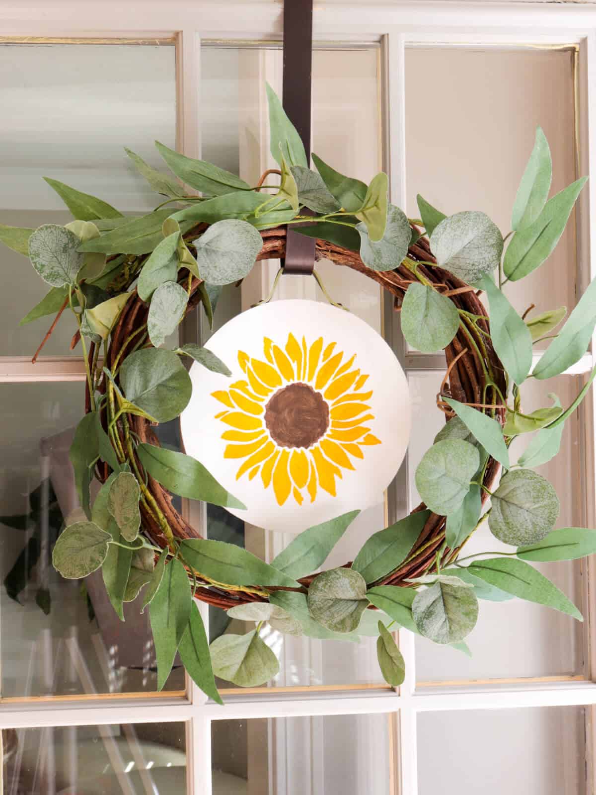 door wreath with an easy seasonal interchangeable disc with a sunflower