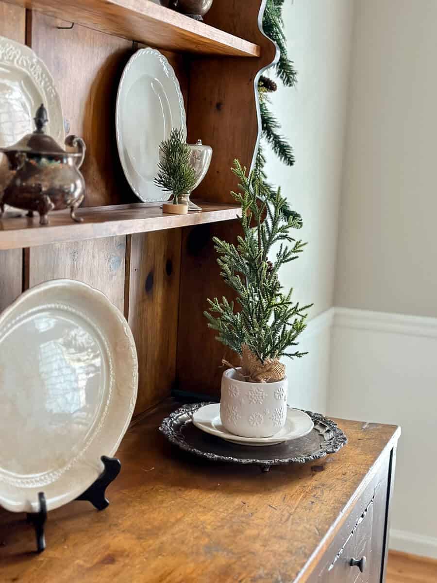 small tree on a vintage hutch