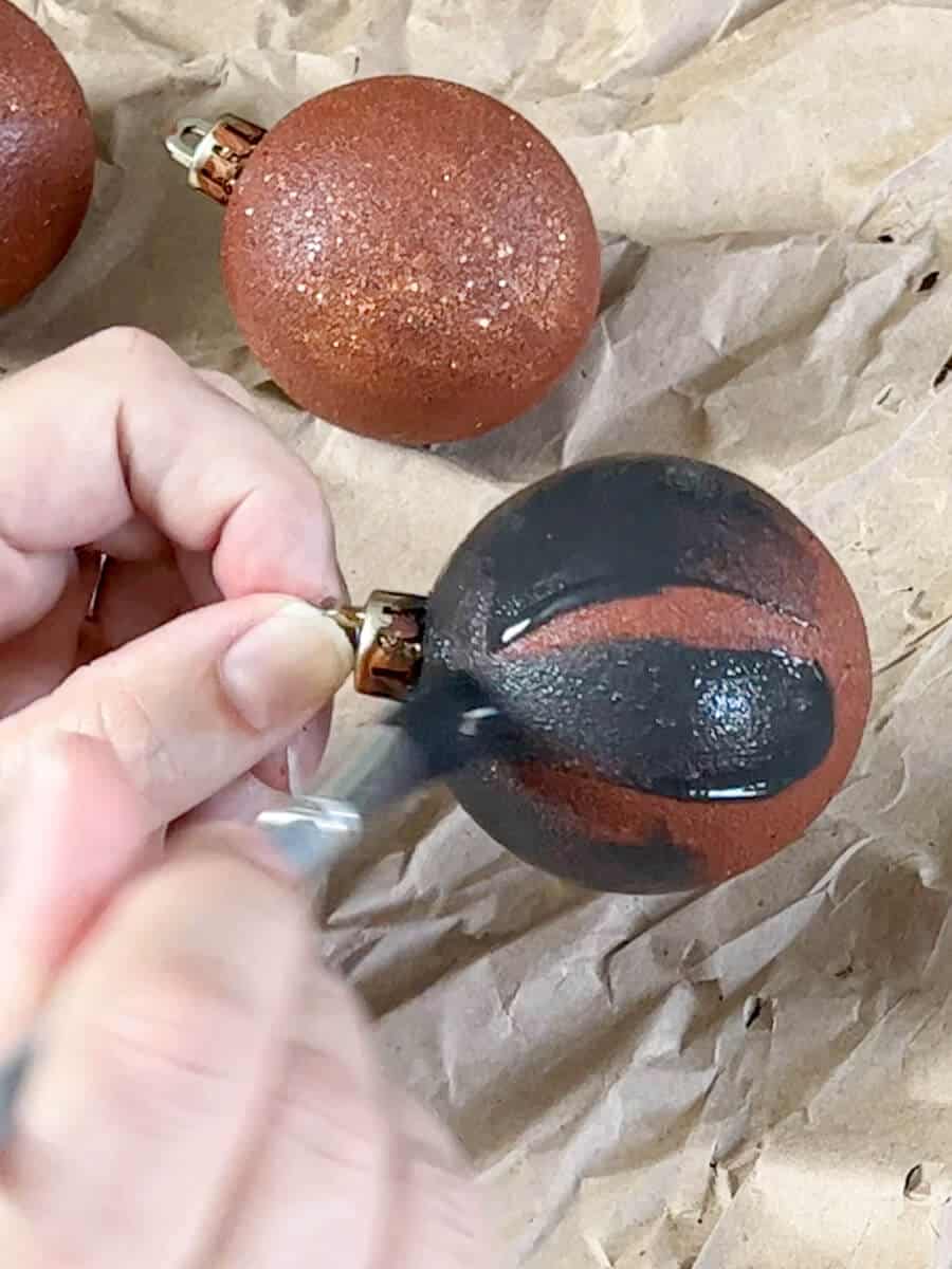 painting an ornament with modern masters rust kit iron top coat