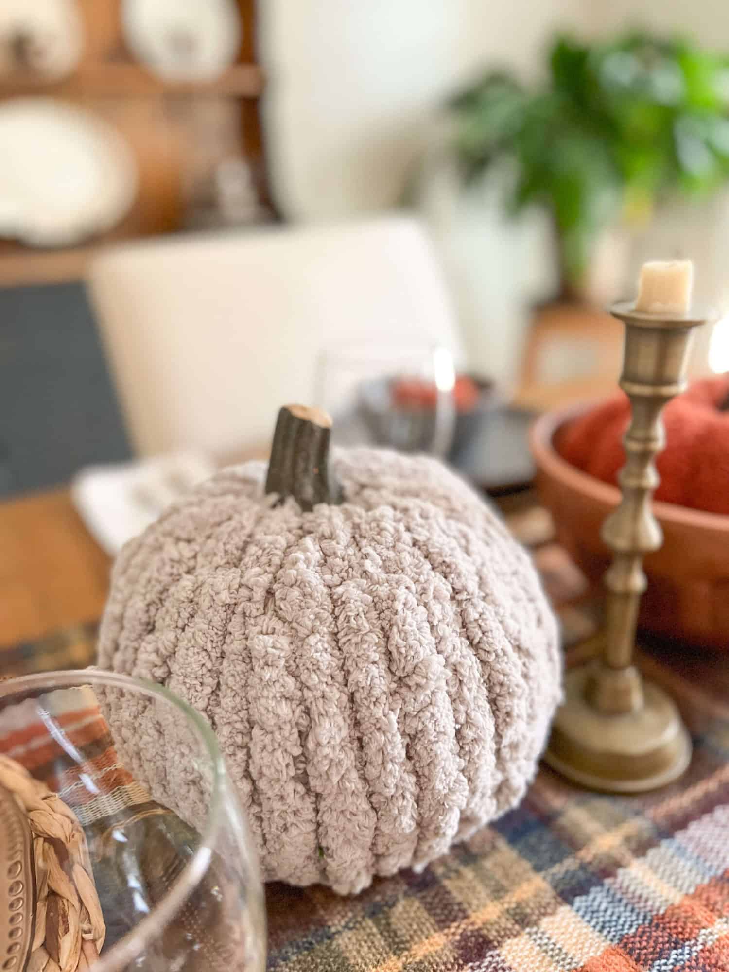 knit covered pumpkins as a simple thanksgiving centerpiece