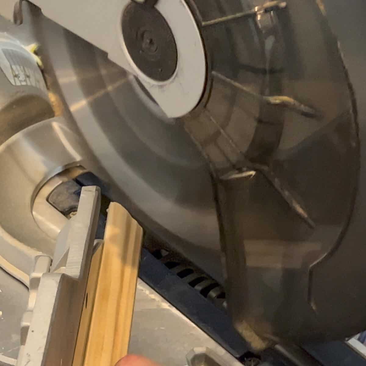 Miter saw cutting picture trim molding